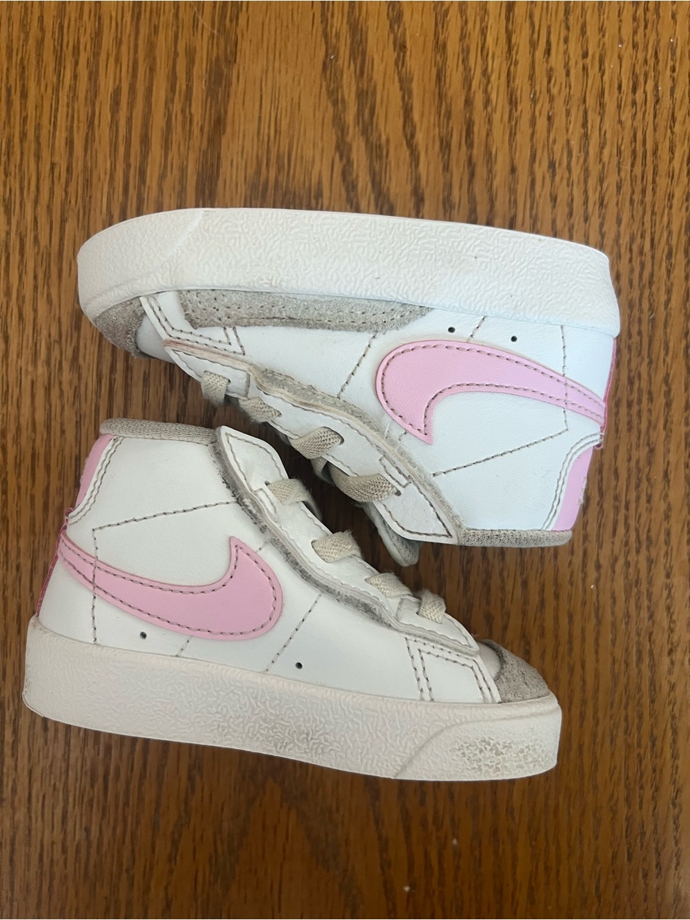 Nike Toddler White High-Top Sneakers with Pink Swoosh